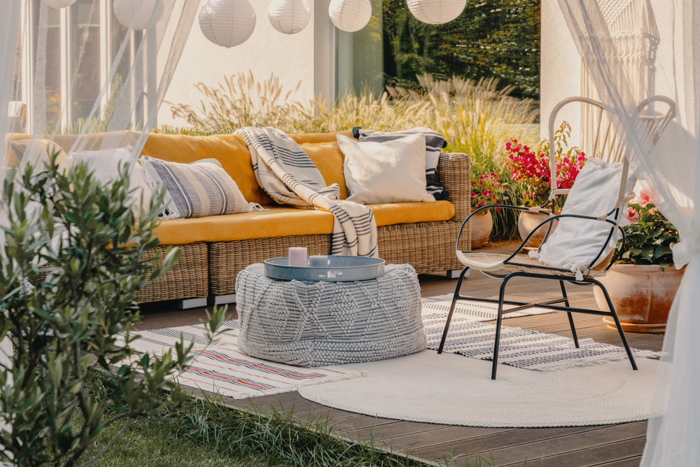 style your patio with table and wicker couch